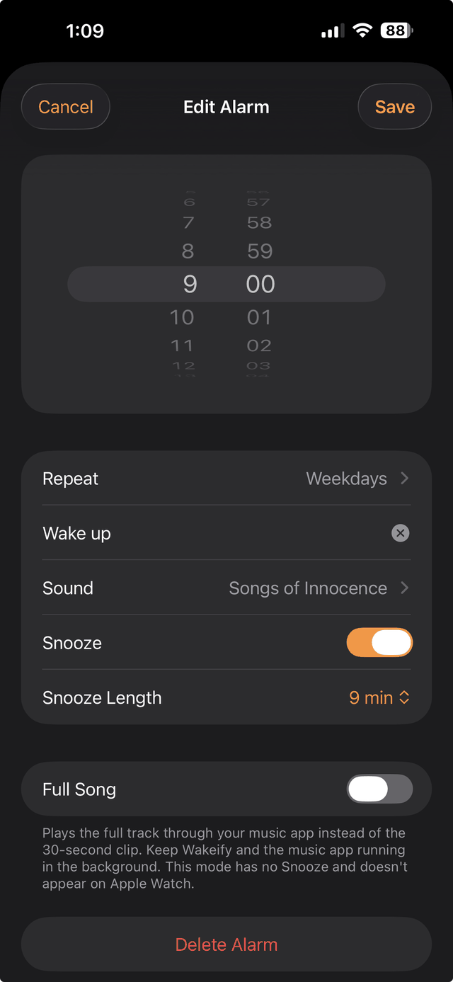 Wakeify's Edit Alarm screen on iPhone. A time wheel is set to 9:00. Below it, Repeat is set to Weekdays, the label reads Wake up, Sound is set to Songs of Innocence, Snooze is switched on with a snooze length of 9 minutes, and a separate Full Song toggle is switched off. A red Delete Alarm button sits at the bottom.